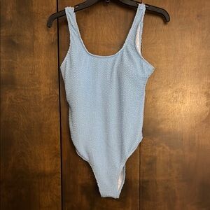 New! Never worn Blue One-Piece Swimsuit with Scoop Neck and High-Cut Legs
